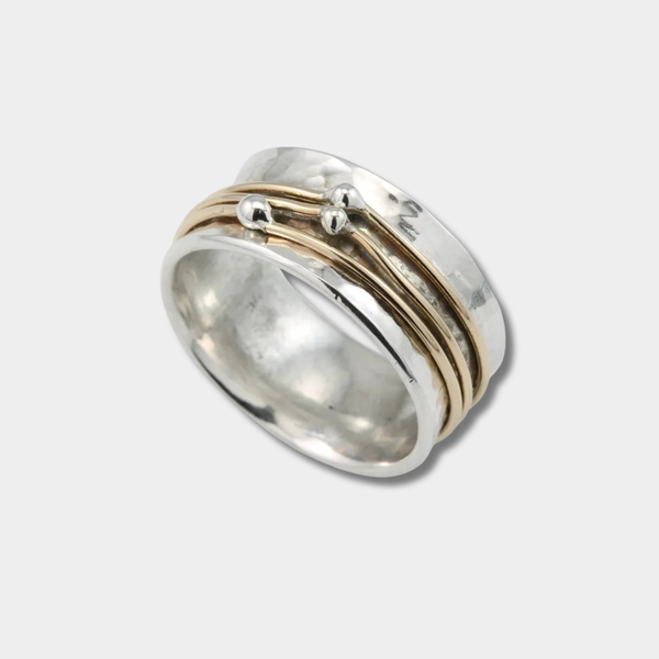 Marlene – Wide, lightly hammered ring with gold accents