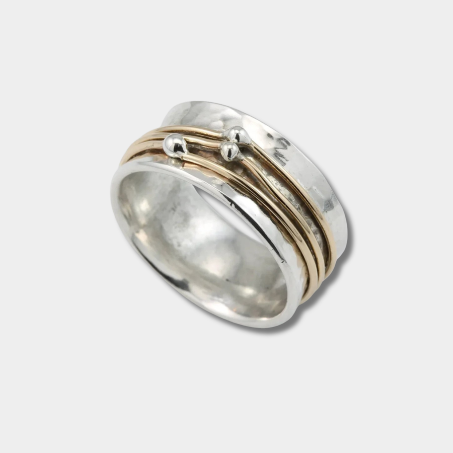 Marlene – Wide, lightly hammered ring with gold accents