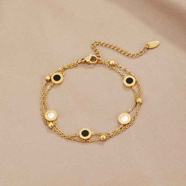 Carla – Delicate gold bracelet with contrasting round elements