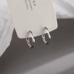 Orecchini in argento sterling con inserto rotondo