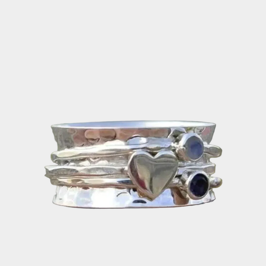 Anello in argento elegante con cuore rotante