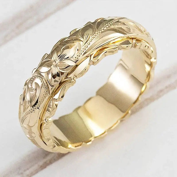 Mila - Gold ring with an ancient-inspired flower