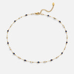 Theresa – Fine necklace with subtle black and white details