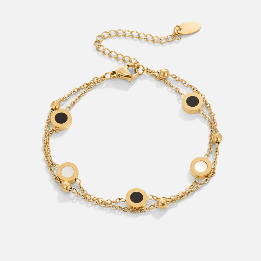 Carla – Delicate gold bracelet with contrasting round elements
