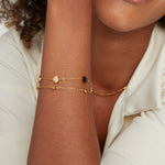 Carla – Delicate gold bracelet with contrasting round elements
