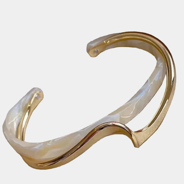 Elegant gold bracelet with white opal